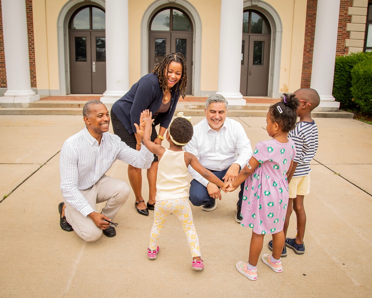 Team EFG candidates celebrating with Teaneck children